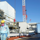 A plant official walking near reactor No. 2 of the Fukushima plant.